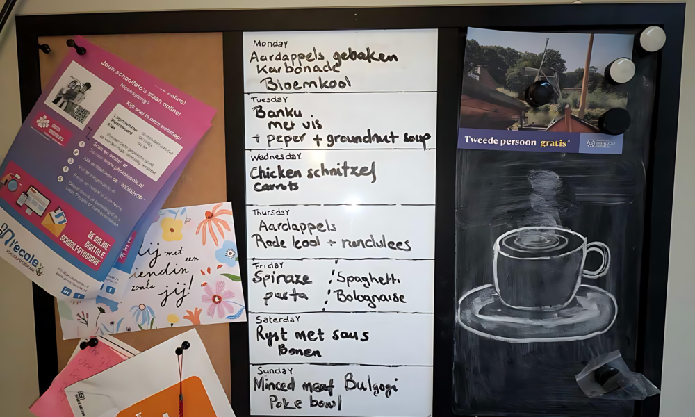 Meal plan written on a whiteboard. Doubles as a board pricker and you black board.