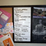 Meal plan written on a whiteboard. Doubles as a board pricker and you black board.